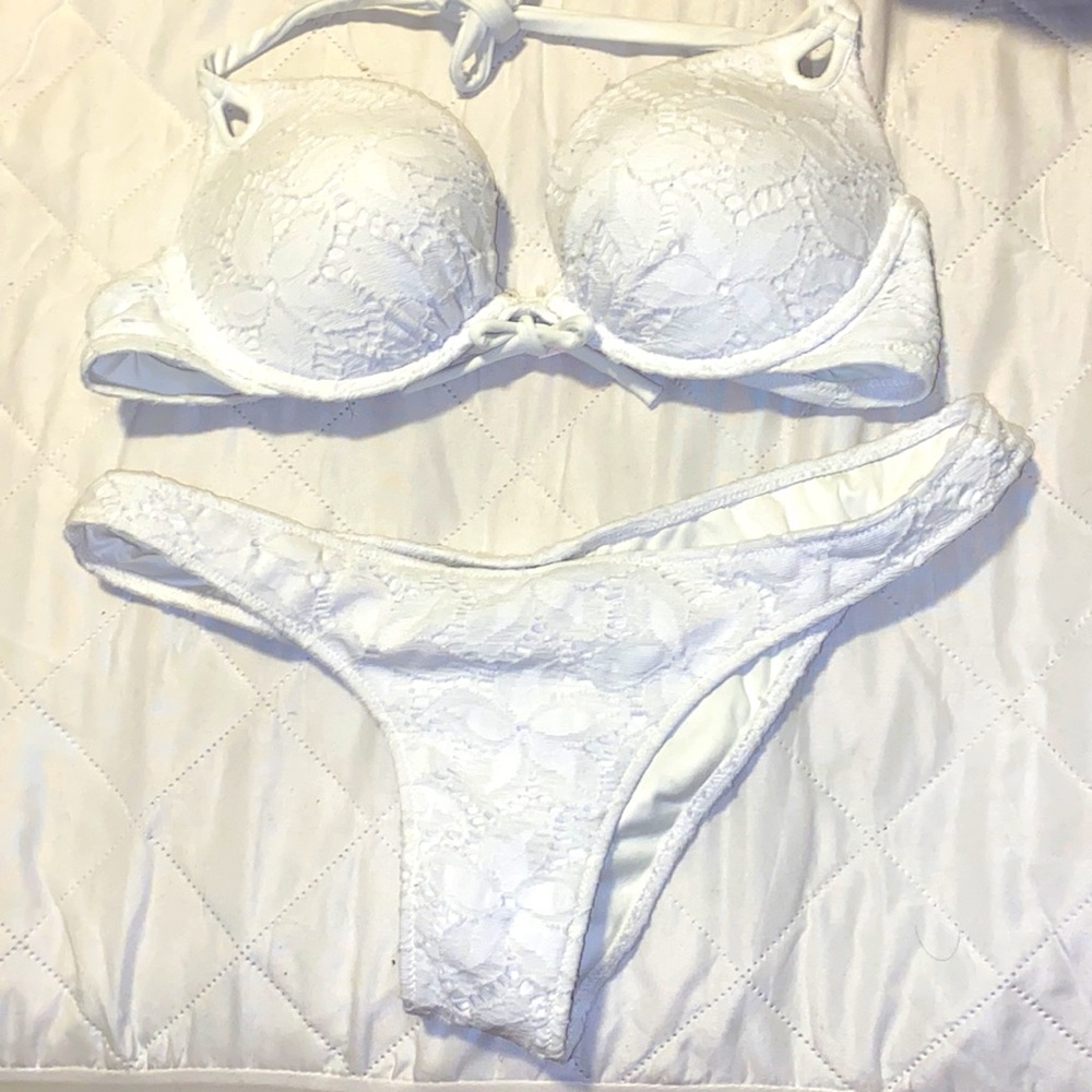 Floral extreme push-up bikini 36 C gently used with cheeky bottoms.